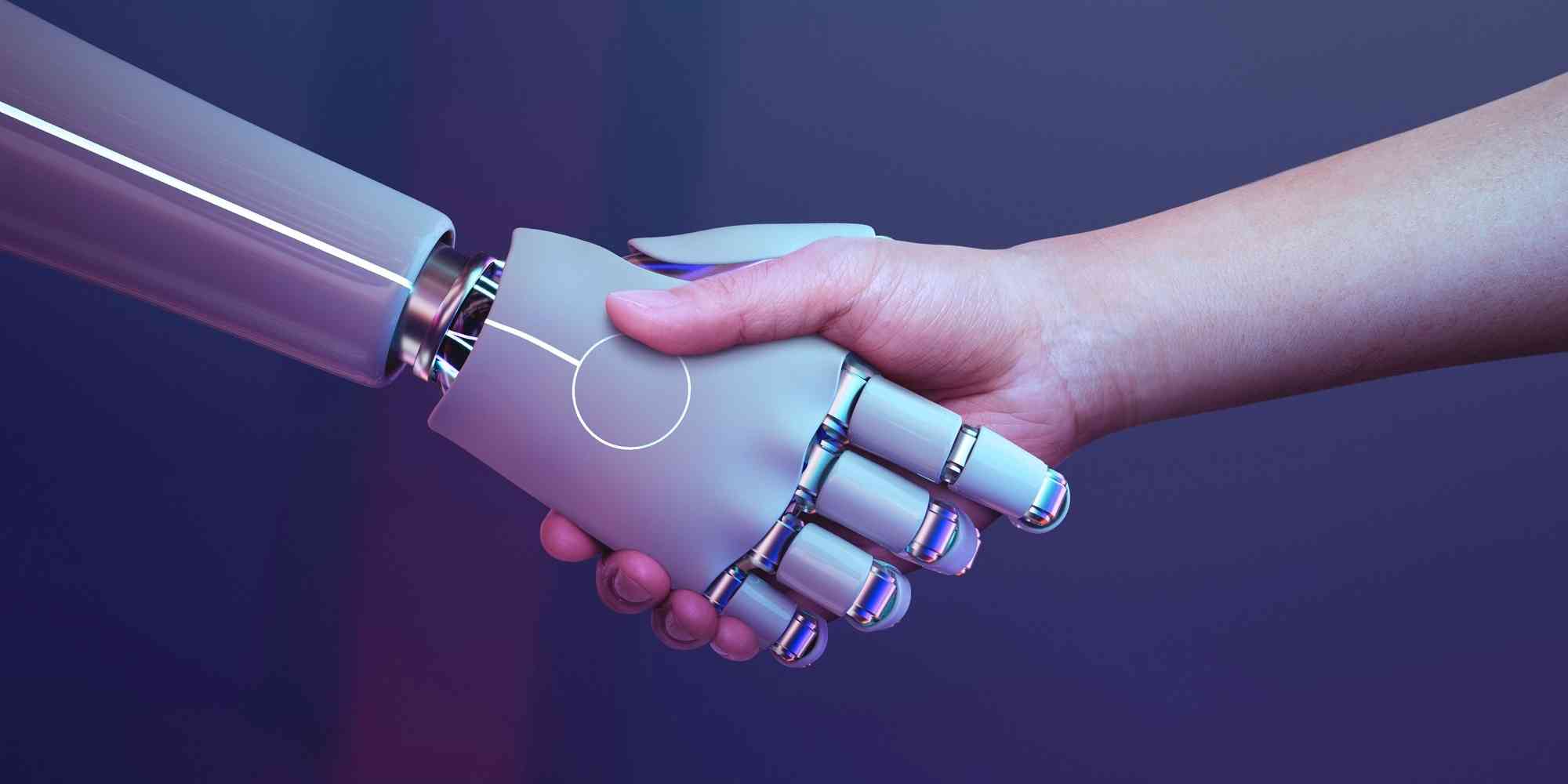 两个机器人握手，代表人类和机器之间的合作与互动。在科技迅速发展的时代里，人工智能正在改变着我们的生活方式和工作方式。它们能够执行各种任务，为人类创造更多的便利、效率和收益。